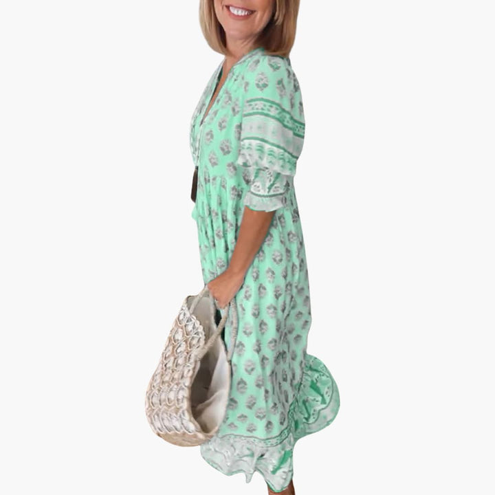 Women’s summer dress with V-neckline and half sleeves