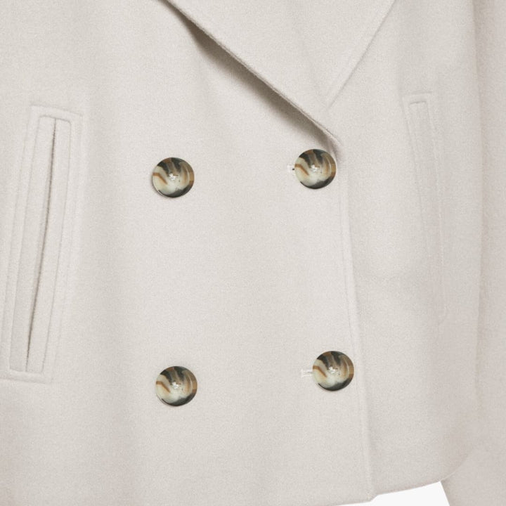 Women’s cropped jacket with double-breasted front and wide lapels