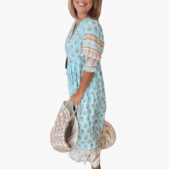 Women’s summer dress with V-neckline and half sleeves