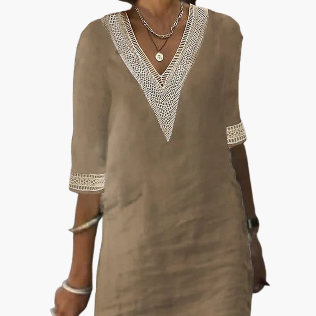 Women’s day dress with V-neckline and three-quarter-length sleeves