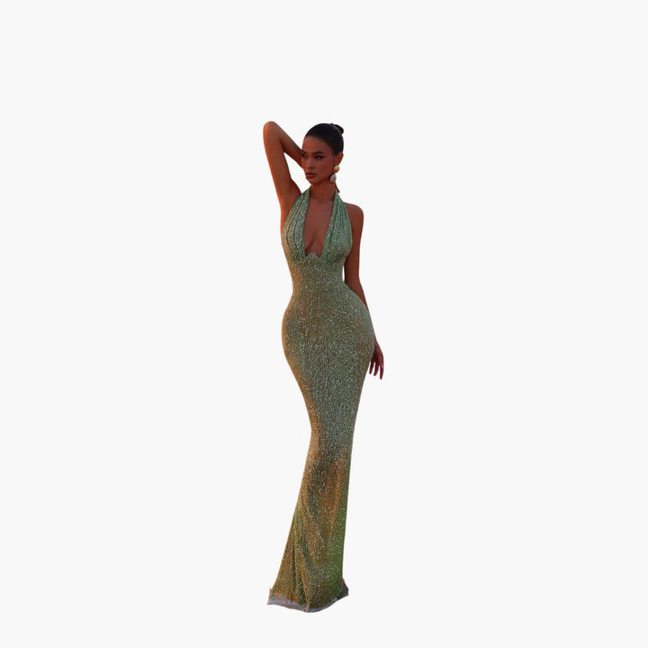 Women’s evening gown with halter neckline and backless design