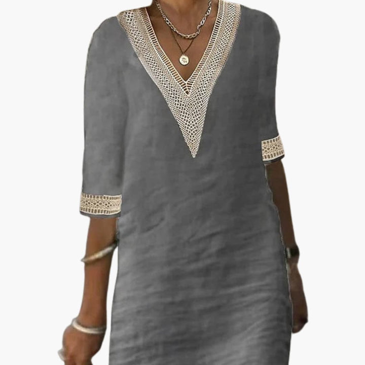 Women’s day dress with V-neckline and three-quarter-length sleeves