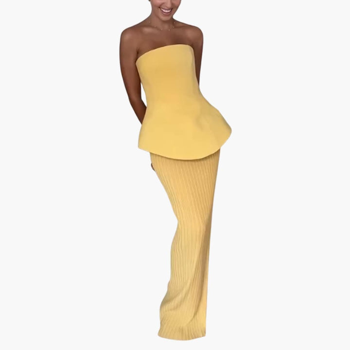 Women’s strapless maxi dress with peplum bodice and pleated skirt