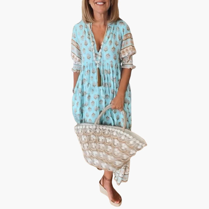 Women’s summer dress with V-neckline and half sleeves
