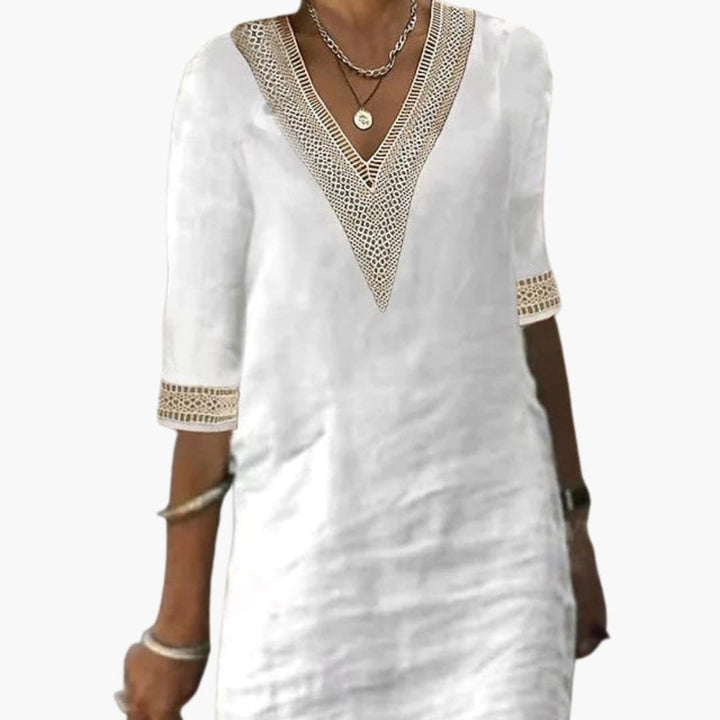 Women’s day dress with V-neckline and three-quarter-length sleeves