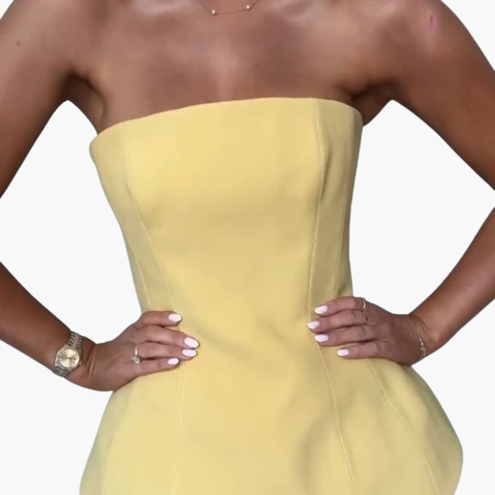 Women’s strapless maxi dress with peplum bodice and pleated skirt