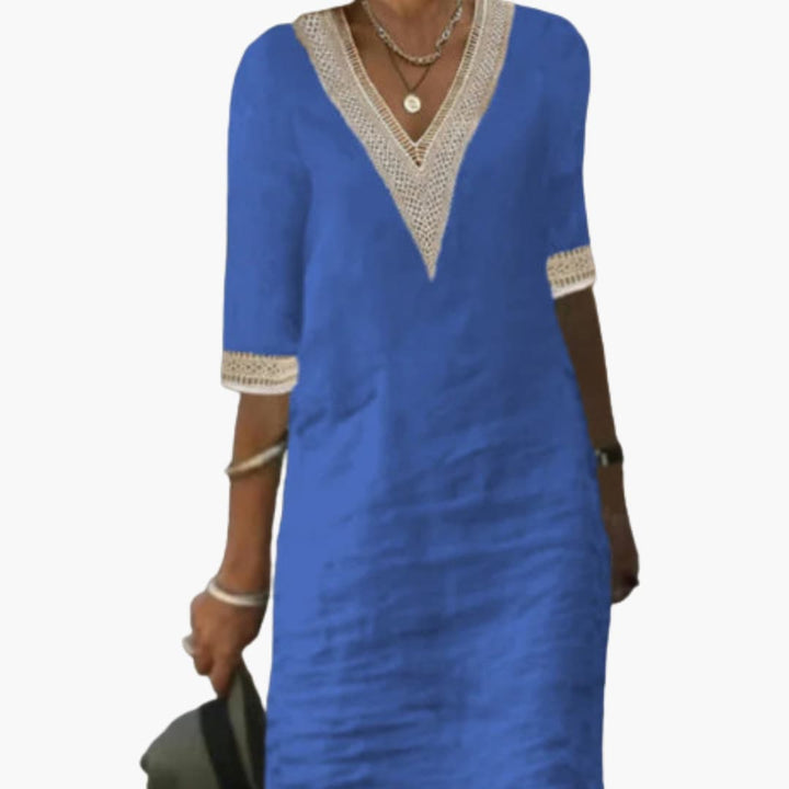 Women’s day dress with V-neckline and three-quarter-length sleeves